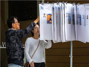 Hong Kong votes in legislative election after deadly fire