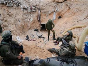 Israeli army takes journalists into a tunnel in a Gaza city it seized and largely flattened