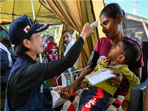 Anguished Sri Lankans queue for care after deadly cyclone