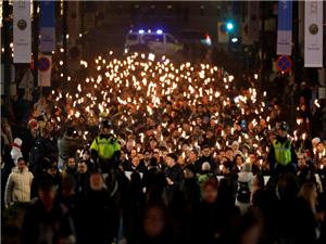 Venezuelans divided on Machado peace prize, return home
