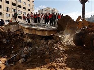 Gaza authorities struggle to recover bodies from rubble amid winter storms
